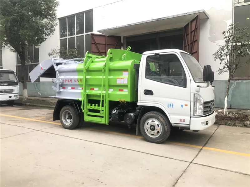 東風多利卡D7國六壓縮式垃圾車車身小巧靈活，上料速度快